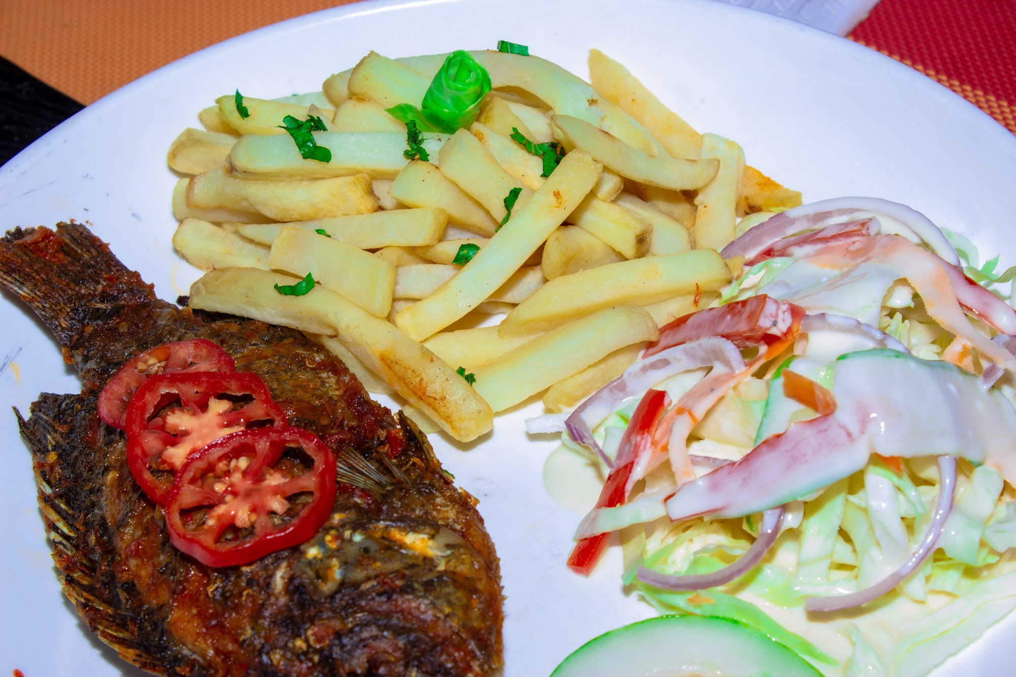 Tilapia braisé, plat signature du restaurant